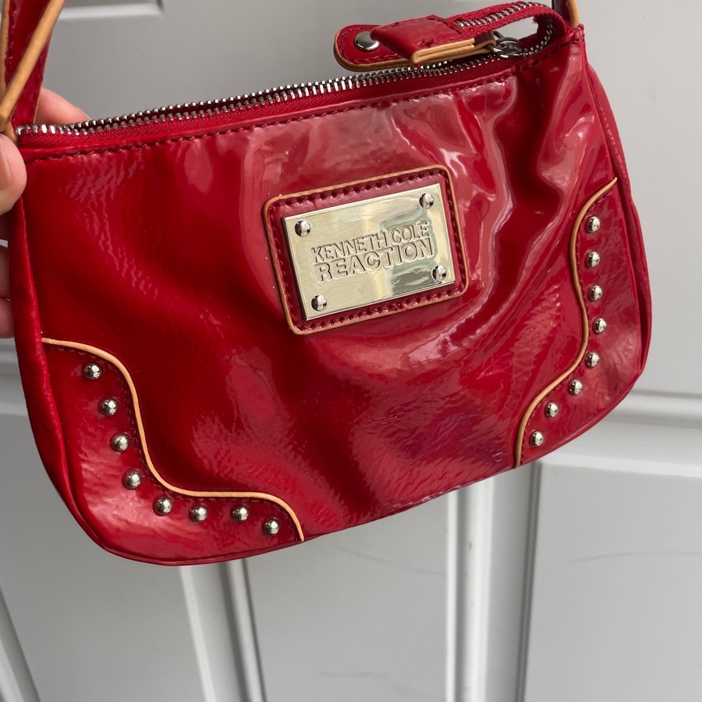 Kenneth Cole Reaction Red Patent purse with studded details